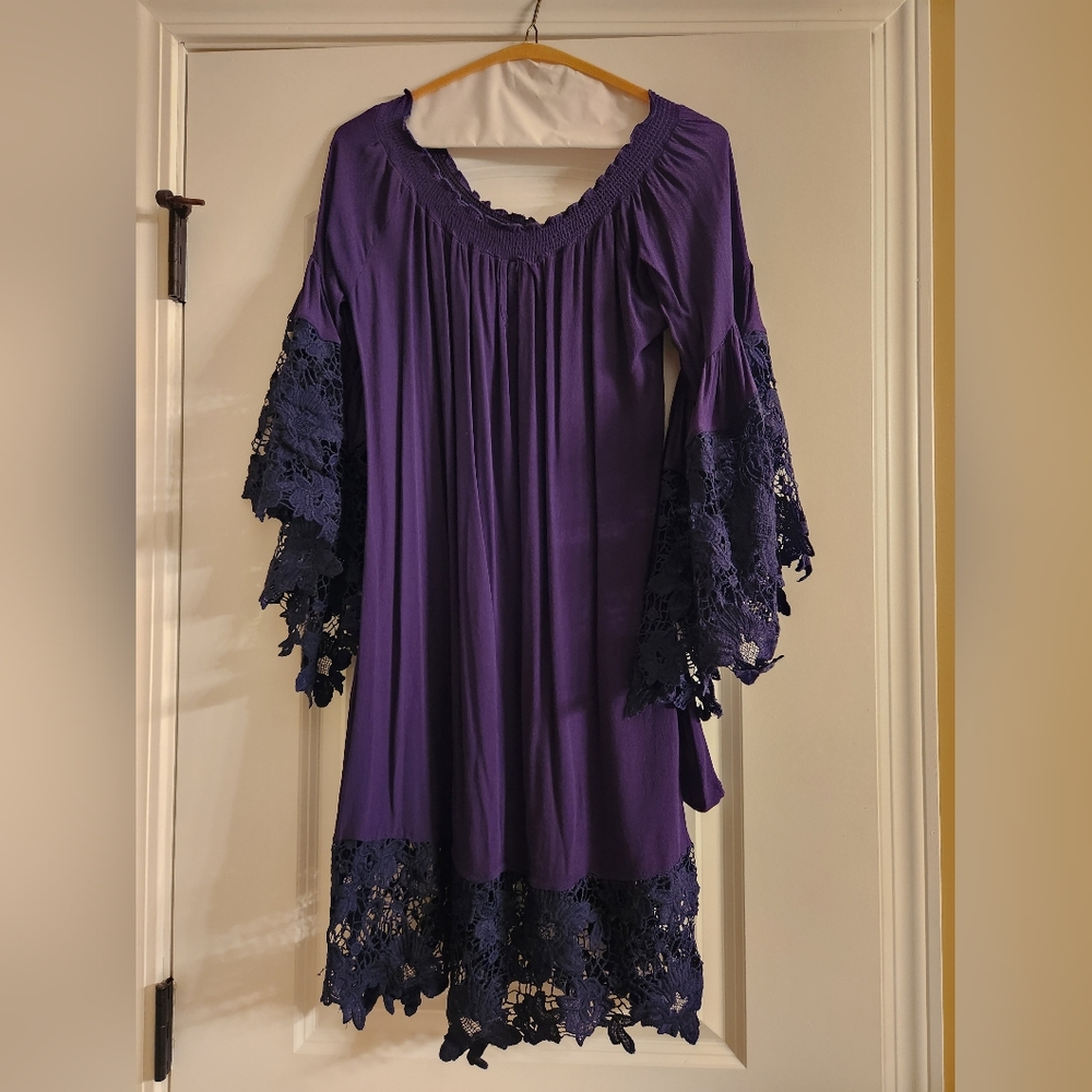 Navy dress with lace sleeves and bottom